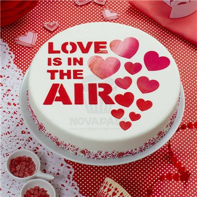 Décorez avec amour : pochoir "Love is in the Air" 25 cm